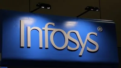 Infosys logo displayed at a corporate event — the company faces a €175,000 labor fine in France
