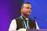 Priyank Kharge speaking at a technology conference on Karnataka Anthropic AI governance collaboration