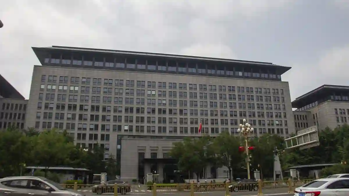The Ministry of Commerce of the People's Republic of China headquarters building on Chang'an Avenue in Beijing under a cloudy sky