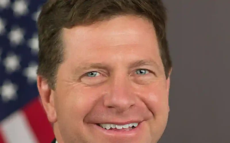 Jay Clayton, Director of National Intelligence, in an official portrait