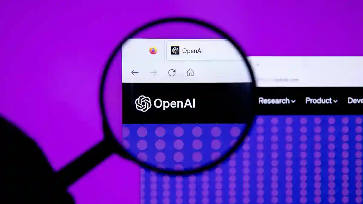 Magnifying glass over the OpenAI website logo on a purple background