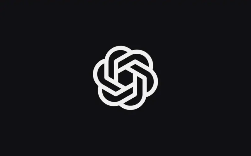 OpenAI blossom logo on a dark background