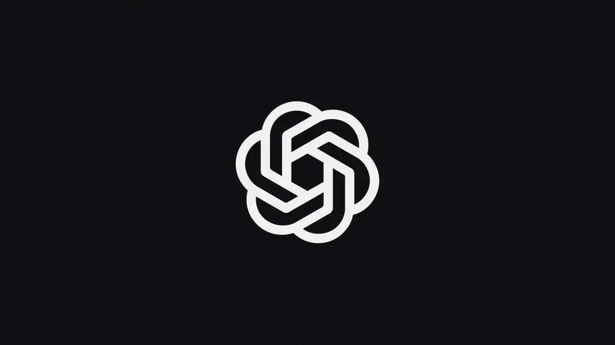 OpenAI blossom logo on a dark background