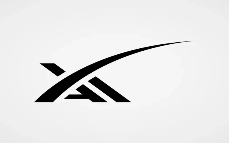 SpaceXAI logo, the xAI letters with the SpaceX swoosh, on a light gray background